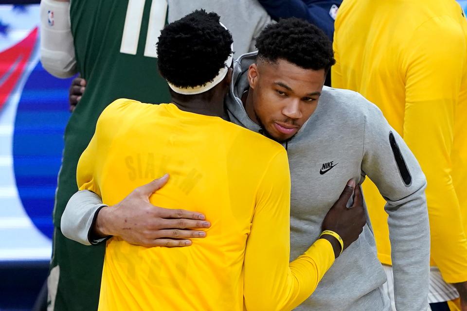 Giannis Antetokounmpo of  the  Bucks congratulates the Pacers' Pascal Siakam after Indiana closed out Milwaukee, 4-2, in the teams' first-round playoff series. Giannis missed the entire series due to injury.