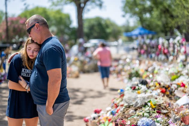 Olivia Luna, 15, is comforted at a memorial in front of Robb Elementary School on June 17 in Uvalde, Texas. (Photo: Brandon Bell via Getty Images)