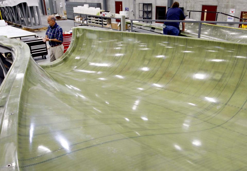 This file photo from August 2008 shows a turbine blade mold inside the TPI Composites facility in Newton.