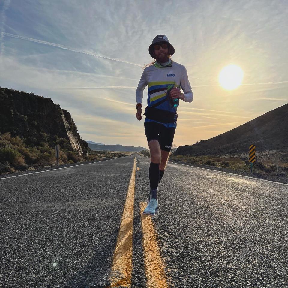 Ultra-runner Michael Wardian traverses a stretch of Route 50 in western Nevada on May 8, 2022.