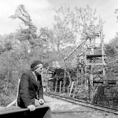 Edward Edwards, of Bontddu, Merrioneth, Wales, at the overgrown pit head of Clogau St David's gold mine in 1966 - Credit: PA Archive/PA Images