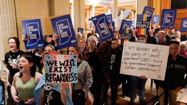 PHOTO: Protesters stand outside of the Senate chamber at the Statehouse, Feb. 22, 2023, in Indianapolis. (Darron Cummings/AP)