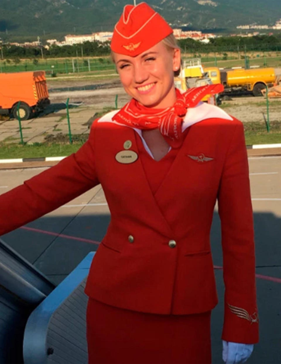 Aeroflot flight attendant Tatyana Kasatkina grabbed passengers by the collar to get them out of the plane. Source: East2West