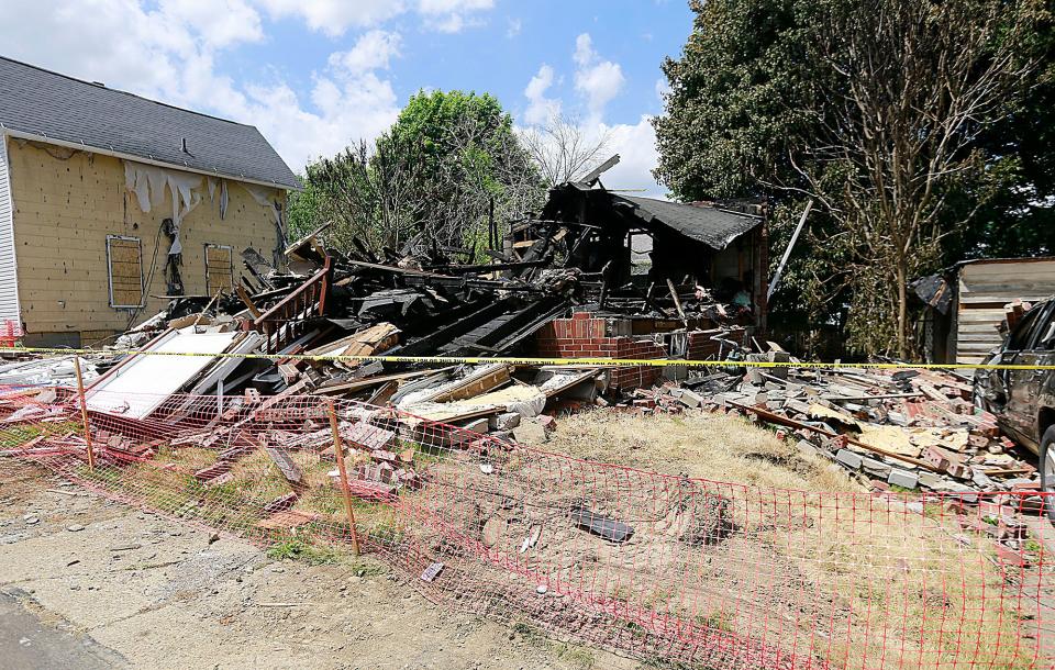 The neighboring homes and vehicles were damaged from this house explosion at 304 Prospect St. on Sunday night.