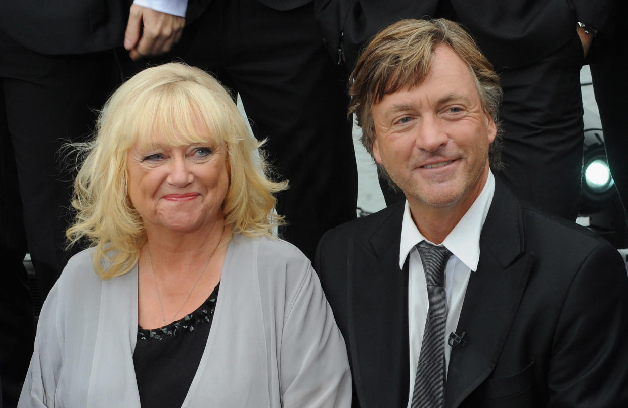 LIVERPOOL, ENGLAND - OCTOBER 03:  Richard Madeley and Judy Finnegan look on as 