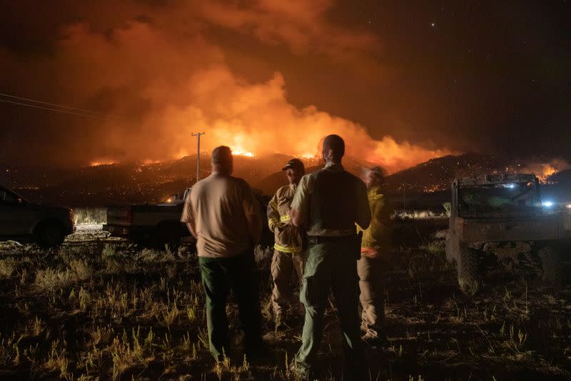 Firefighters monitor Brattain Fire from Withers Ranch in Paisley, Oregon