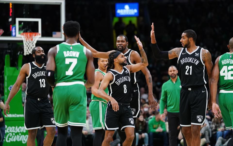 Nov 24, 2021; Boston, Massachusetts, USA; The Brooklyn Nets react after a play against the Boston Celtics in the first half at TD Garden.