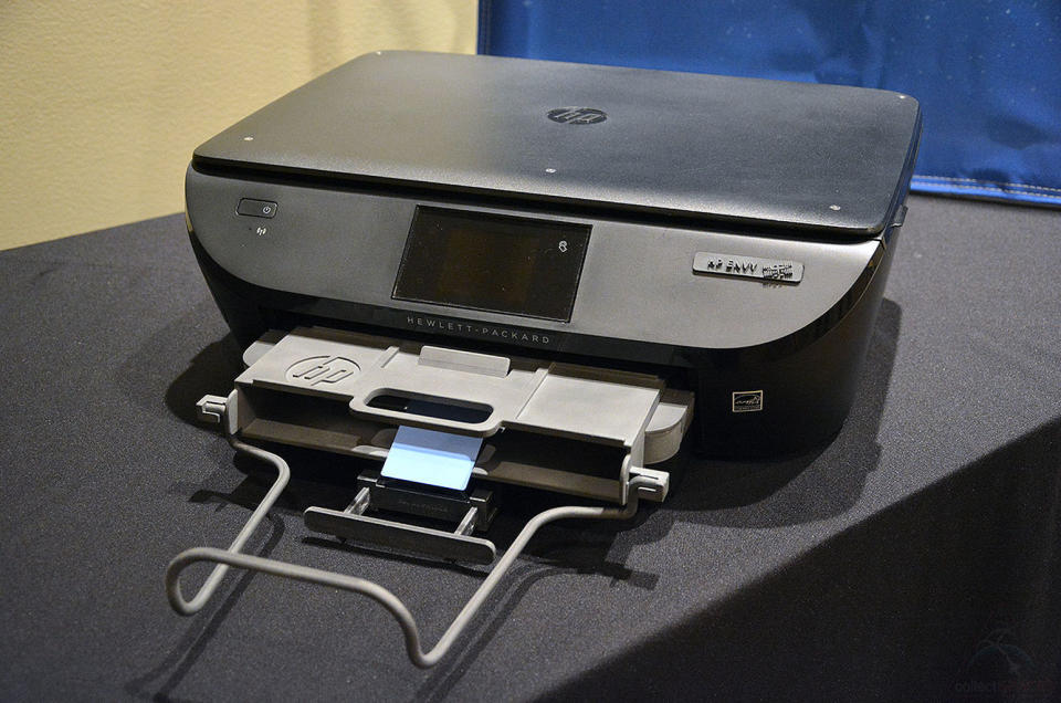 The new HP Envy ISS printer for the International Space Station is built from flame retardant materials and has 3D printed parts to direct paper flow. <cite>collectSPACE.com</cite>