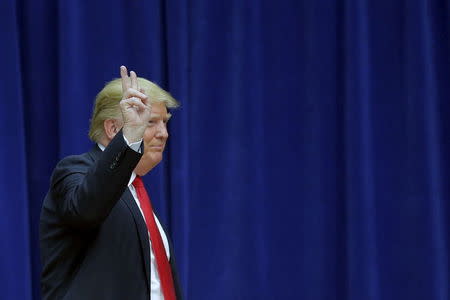 U.S. Republican presidential candidate Donald Trump takes the stage at a campaign rally in Marshalltown, Iowa January 26, 2016. REUTERS/Brian Snyder