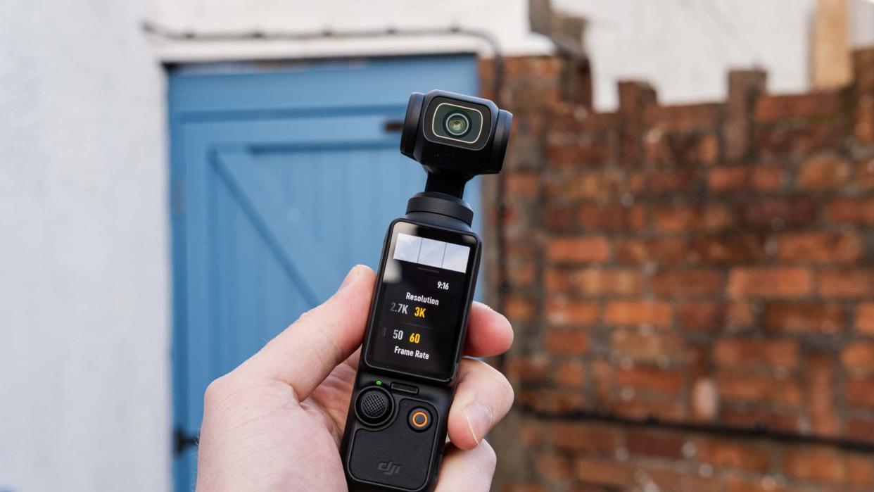  DJI Osmo Pocket 3 held in hand. 