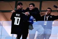 <p>Former Argentina player Diego Maradona holds a tribute shirt for Lionel Messi of Argentina before the 2018 FIFA World Cup Russia group D match between Argentina and Croatia at Nizhny Novgorod Stadium on June 21, 2018 in Nizhny Novgorod, Russia. (Photo by Chris Brunskill/Fantasista/Getty Images) </p>