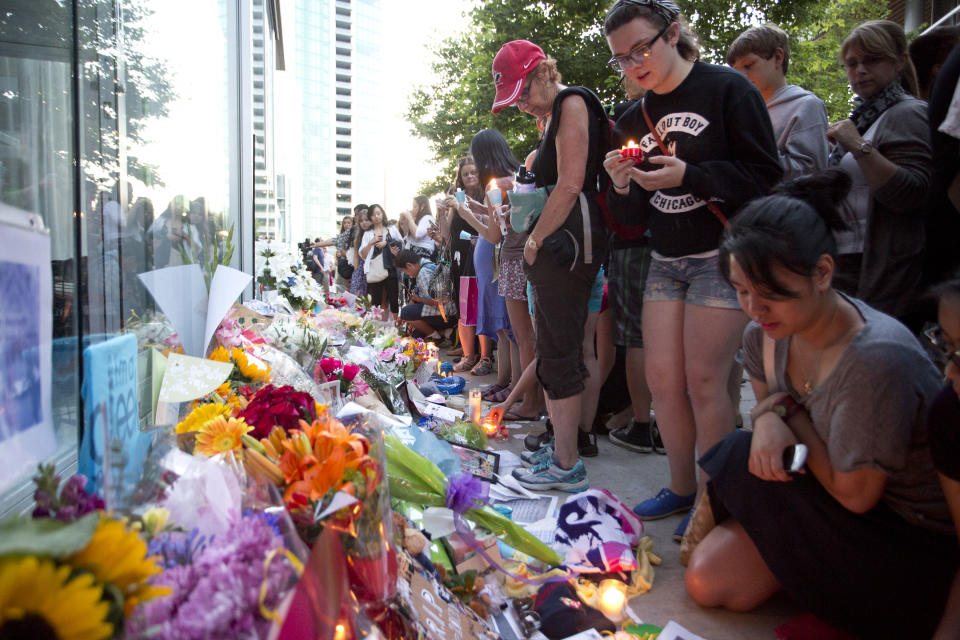 VANCOUVER, BC - JULY 19:  Fans pay Tribute at the Candle Light Vigil for Cory Monteith at the Fairmont Pacific Rim on July 19, 2013 in Vancouver, Canada.  (Photo by Phillip Chin/Getty Images)