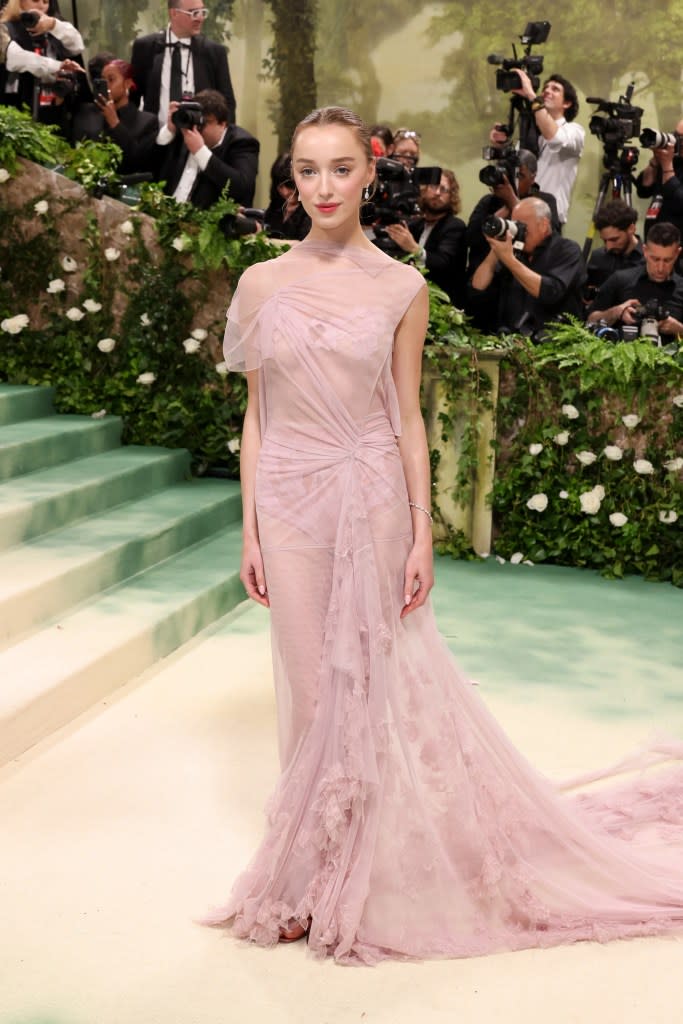 Phoebe Dynevor attends The 2024 Met Gala Celebrating "Sleeping Beauties: Reawakening Fashion" at The Metropolitan Museum of Art on May 06, 2024 in New York City.