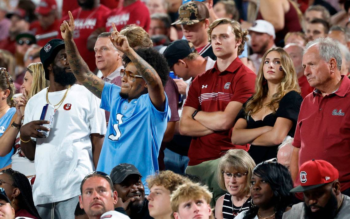 A North Carolina fan celebrates a Tar Heel touchdown during the second half of UNC’s 31-17 victory over South Carolina in the Duke’s Mayo Classic at Bank of America Stadium in Charlotte, N.C., Saturday, Sept. 2, 2023.