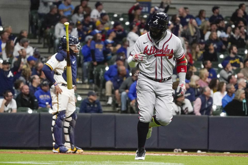 Atlanta Braves' Marcell Ozuna hits a two-run home run during the eighth inning of a baseball game against the Milwaukee Brewers Tuesday, May 17, 2022, in Milwaukee. (AP Photo/Morry Gash)