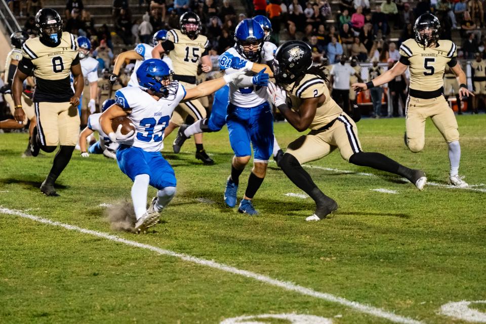 Bartram Trail Bears Laython Biddle (33) runs with the ball during the first half between the Buchholz Bobcats and Bartram Trail Bears at Citizens Field in Gainesville, FL on Thursday, October 19, 2023. [Chris Watkins/Gainesville Sun]