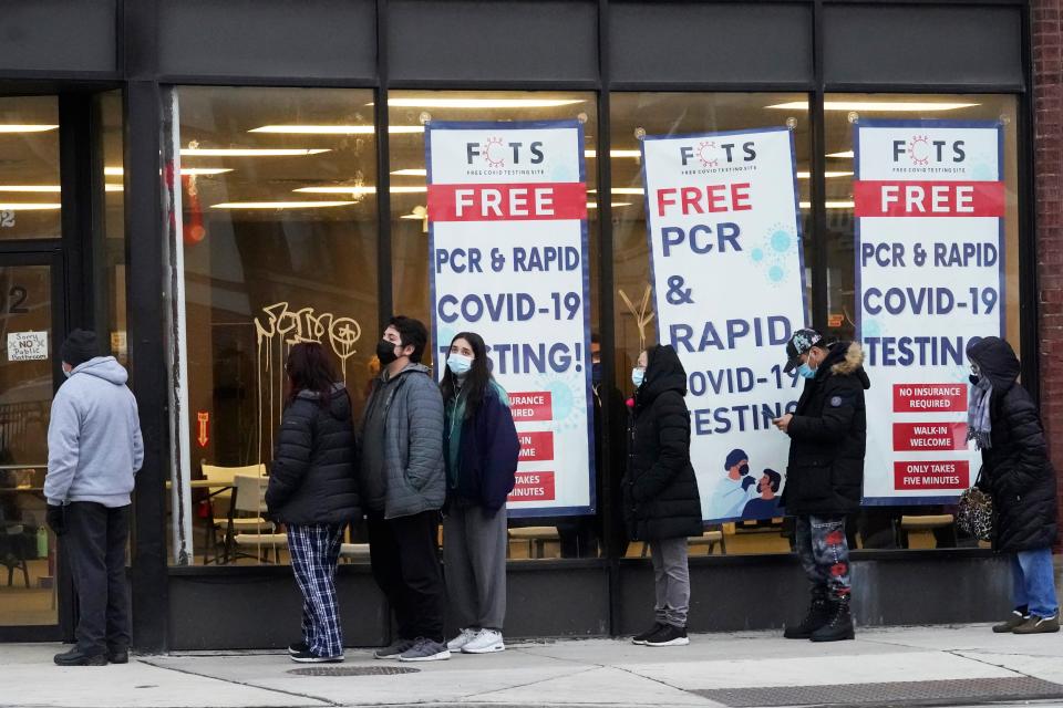 People line up to take a coronavirus test at a free testing site in Chicago on Dec. 30, 2021.