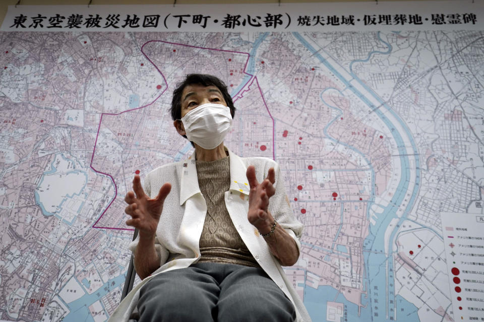 Mitsuyo Hoshino, 86, who lost her parents and siblings to the Great Tokyo Air Raid on March 10, 1945, speaks on her experience during an interview with the Associated Press at the Center for the Tokyo Raids and War Damage in Tokyo Tuesday, July 28, 2020. In Japan, war orphans were punished for surviving. They were bullied. They were called trash, sometimes rounded up by police and put in cages. Some were sent to institutions or sold for labor. They were targets of abuse and discrimination. Now, 75 years after the war's end, some are revealing their untold stories of recovery and pain, underscoring Japan’s failure to help its own people. (AP Photo/Eugene Hoshiko)