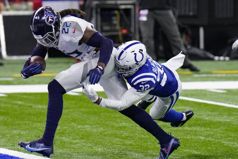 Tennessee Titans running back Derrick Henry (22) gets past Indianapolis Colts free safety Julian Blackmon (32) for a touchdown in the first half of an NFL football game in Indianapolis, Sunday, Nov. 29, 2020. (AP Photo/AJ Mast)