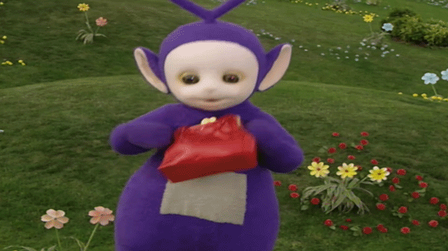 Tinky Winky and the controversial red handbag. (GIF: YouTube/Teletubbies)