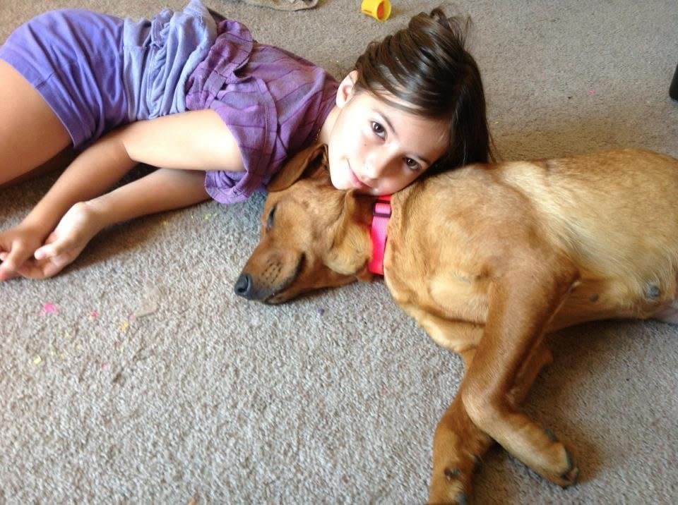 My 9 yo and Kira. A rescue from the Austin Humane Society.