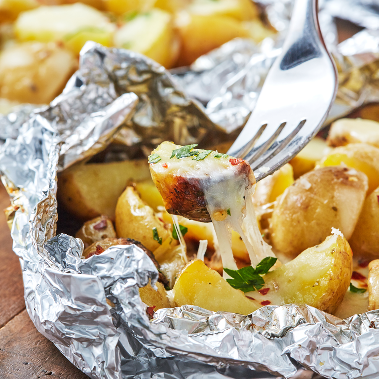 <p>Cooking over the campfire is our favorite thing to do, and throwing everything into a <a href="https://www.delish.com/cooking/recipe-ideas/g2854/foil-pack-recipes/" rel="nofollow noopener" target="_blank" data-ylk="slk:foil pack;elm:context_link;itc:0;sec:content-canvas" class="link ">foil pack</a> makes it so easy! These cook up fast and make the perfect <a href="https://www.delish.com/cooking/g1214/summer-side-dish-recipes/" rel="nofollow noopener" target="_blank" data-ylk="slk:summer side dish;elm:context_link;itc:0;sec:content-canvas" class="link ">summer side dish</a>.</p><p>Get the <strong><a href="https://www.delish.com/cooking/g1214/summer-side-dish-recipes/" rel="nofollow noopener" target="_blank" data-ylk="slk:Campfire Potatoes recipe;elm:context_link;itc:0;sec:content-canvas" class="link ">Campfire Potatoes recipe</a></strong>.</p>