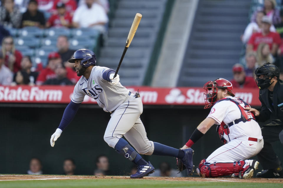 Tampa Bay Rays' Yandy Diaz (2) singles during the first inning of a baseball game against the Los Angeles Angels in Anaheim, Calif., Monday, May 9, 2022. (AP Photo/Ashley Landis)