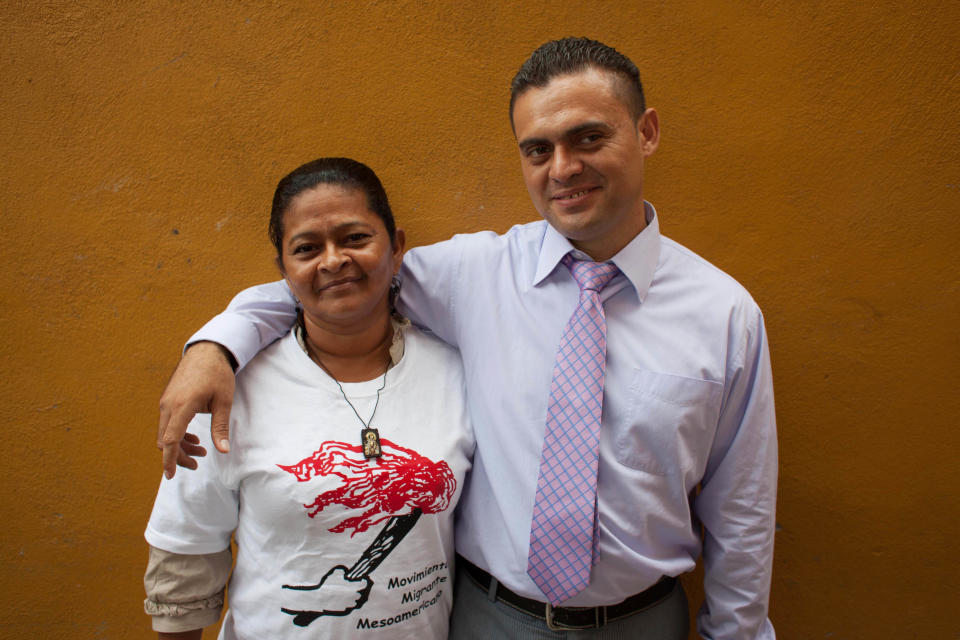 In this photo taken on Friday, Oct. 19, 2012, Olga Marina Hernandez, a member of the Convoy of Central American Mothers, poses for a photo with her son Gabriel Salmeron, in Escobedo, Mexico. The convoy mostly comprised of women from Central America, travel 2,800 miles through Mexico to search for their relatives who left for a better life and then disappeared on their journey to the U.S. Hernandez, 52, of Honduras, came last year looking with the convoy for her 31-year-old son whom she hadn’t heard from since he left five years earlier. Salmeron's girlfriend saw the photograph the mother was carrying when it was published in the local press and mother and son were reunited. About 100 have been reunited through similar trips through Mexico over six years. (AP Photo)