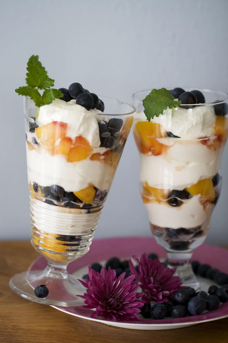In this image taken on April 15, 2013, easy blueberry-peach mousse parfaits are shown in Concord, N.H. (AP Photo/Matthew Mead)