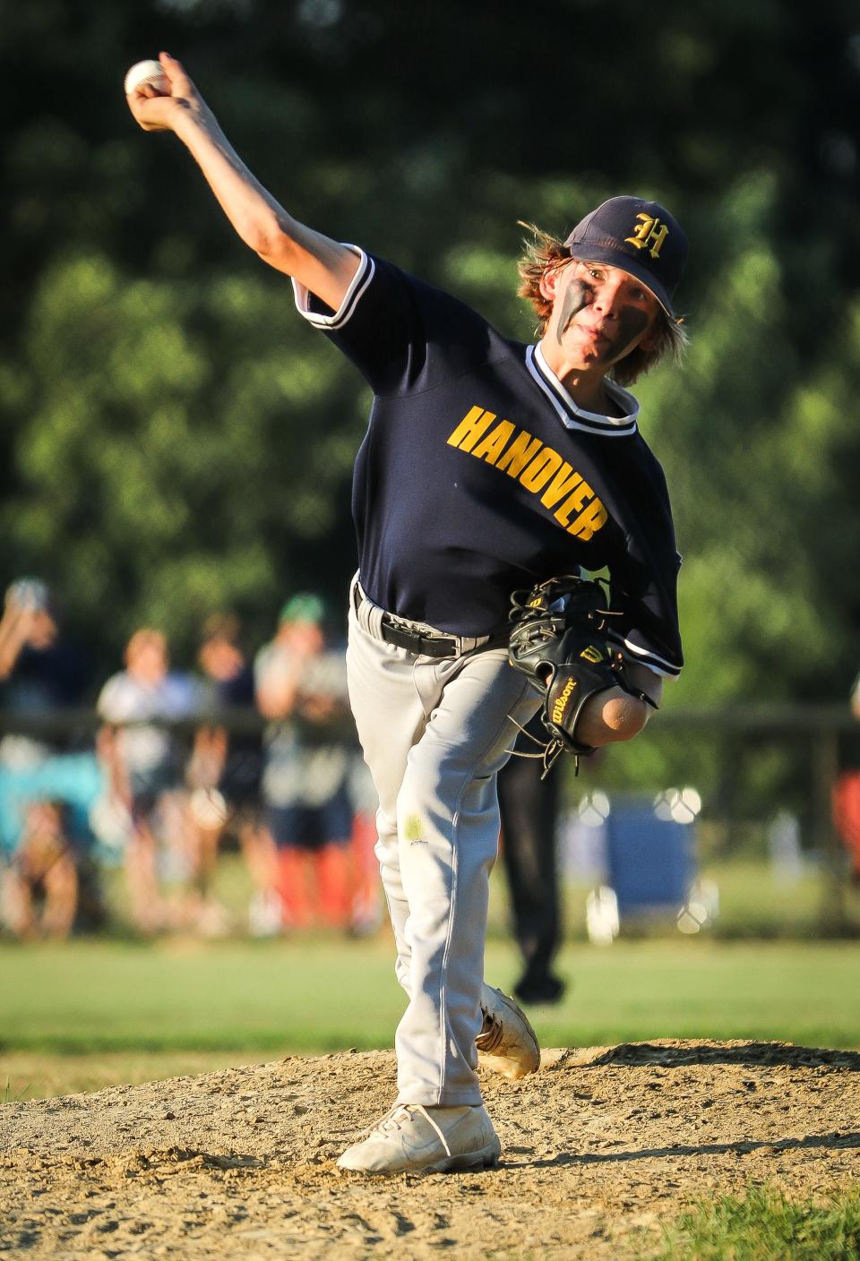 Hanover U12's Dillon Aikins delivers a pitch during a game against Middleboro at Forge Pond Park in Hanover on Wednesday, July 20, 2022.