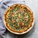 <p>A spinach and bacon quiche gets a fun twist with the addition of hash browns. Shredded potatoes create a gluten-free crust for this healthy quiche that's sure to be a crowd-pleasing breakfast or brunch.</p> <p> <a href="https://www.eatingwell.com/recipe/265480/bacon-spinach-quiche-with-hash-brown-crust/" rel="nofollow noopener" target="_blank" data-ylk="slk:View Recipe;elm:context_link;itc:0;sec:content-canvas" class="link ">View Recipe</a></p>