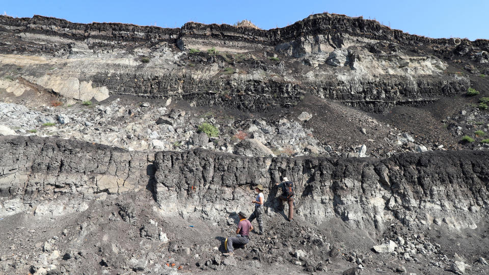 Different layers of rocks at a mine site in Greece.