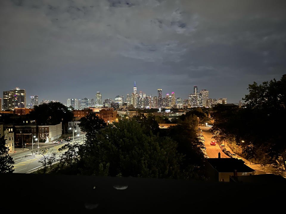 <p>A photo from the iPhone 14 Pro's wide camera of Manhattan buildings at night.</p>
