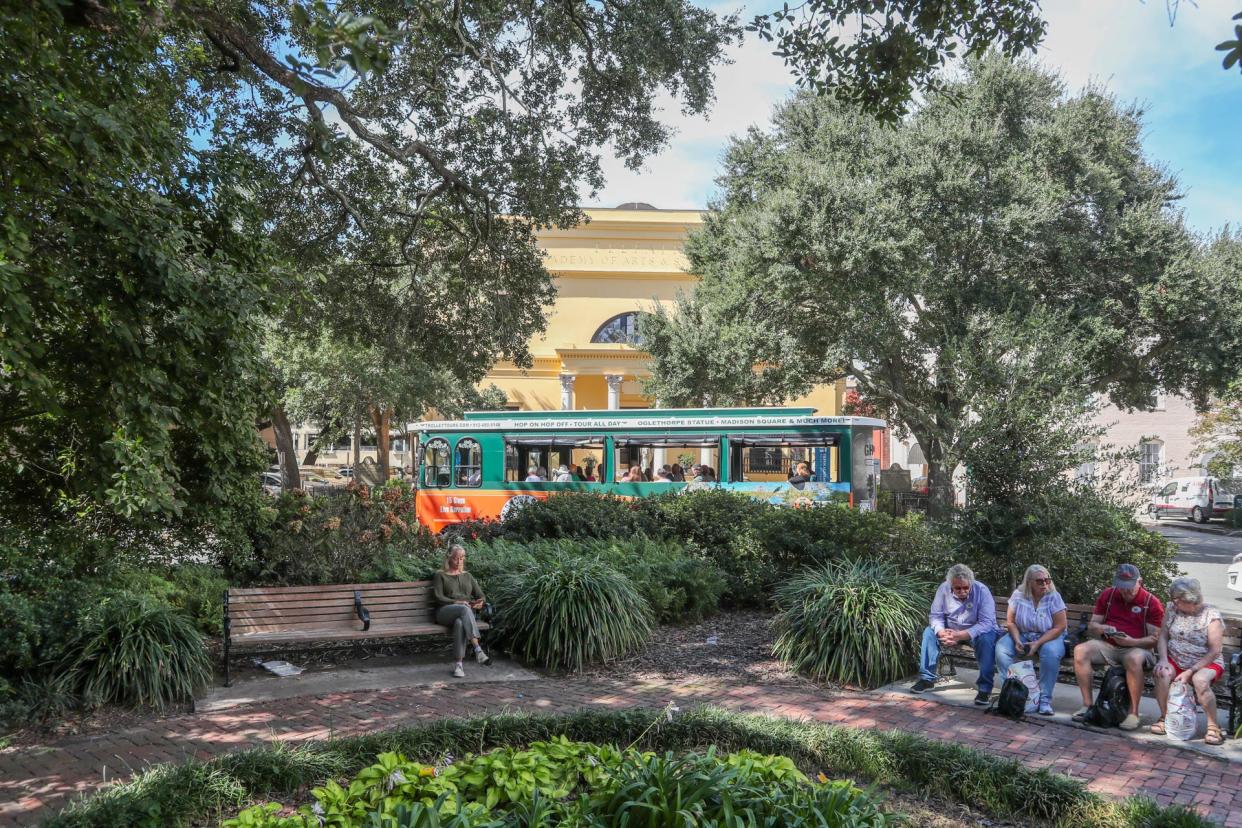 An Old Town Trolley drives around Telfair Square.