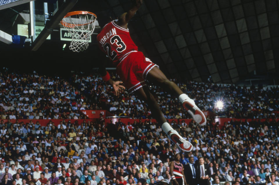 Michael Jordan elevates for a slam during the 1985 NBA Slam Dunk contest. (Getty Images)