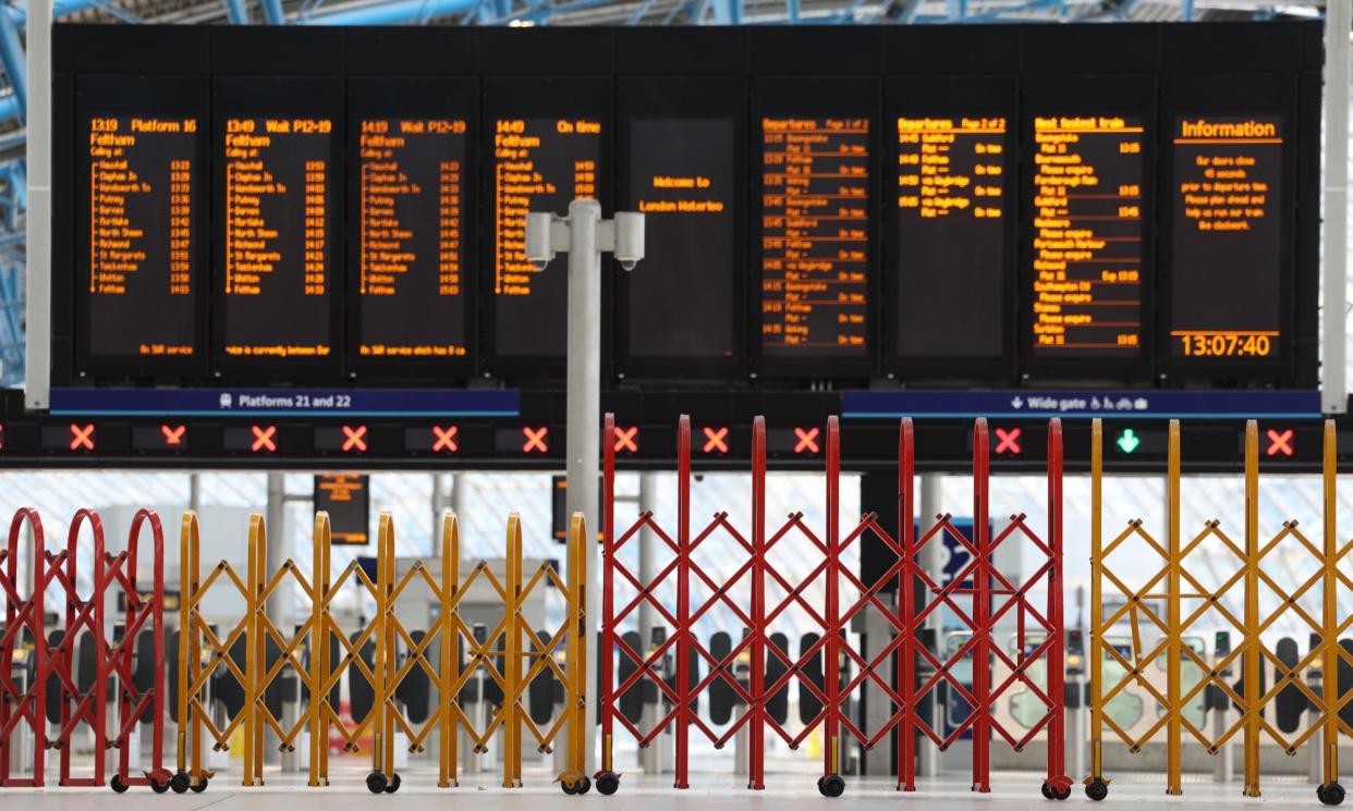 <span>Platforms closed at Waterloo Station in London on 7 May 2024 during a three-day strike.</span><span>Photograph: Neil Hall/EPA</span>