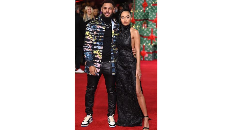Andre Gray in a colourful jacket and Leigh-Anne Pinnock in a black halterneck dress at the world premiere of Boxing Day