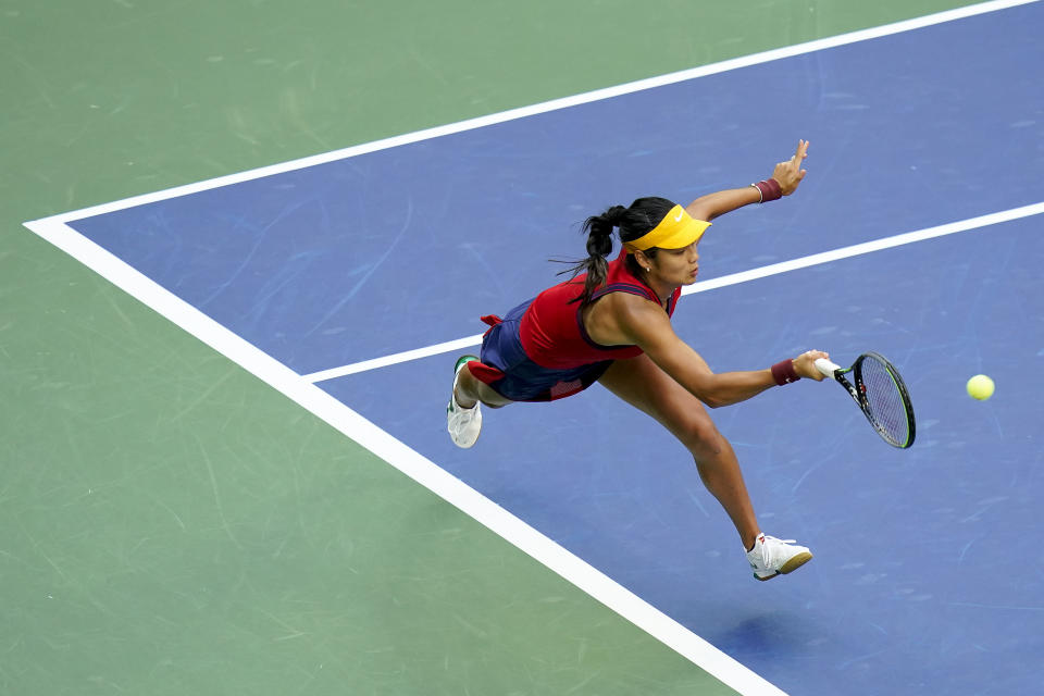 Emma Raducanu, of Britain, returns a shot to Leylah Fernandez, of Canada, during the women's singles final of the US Open tennis championships, Saturday, Sept. 11, 2021, in New York. (AP Photo/Frank Franklin II)