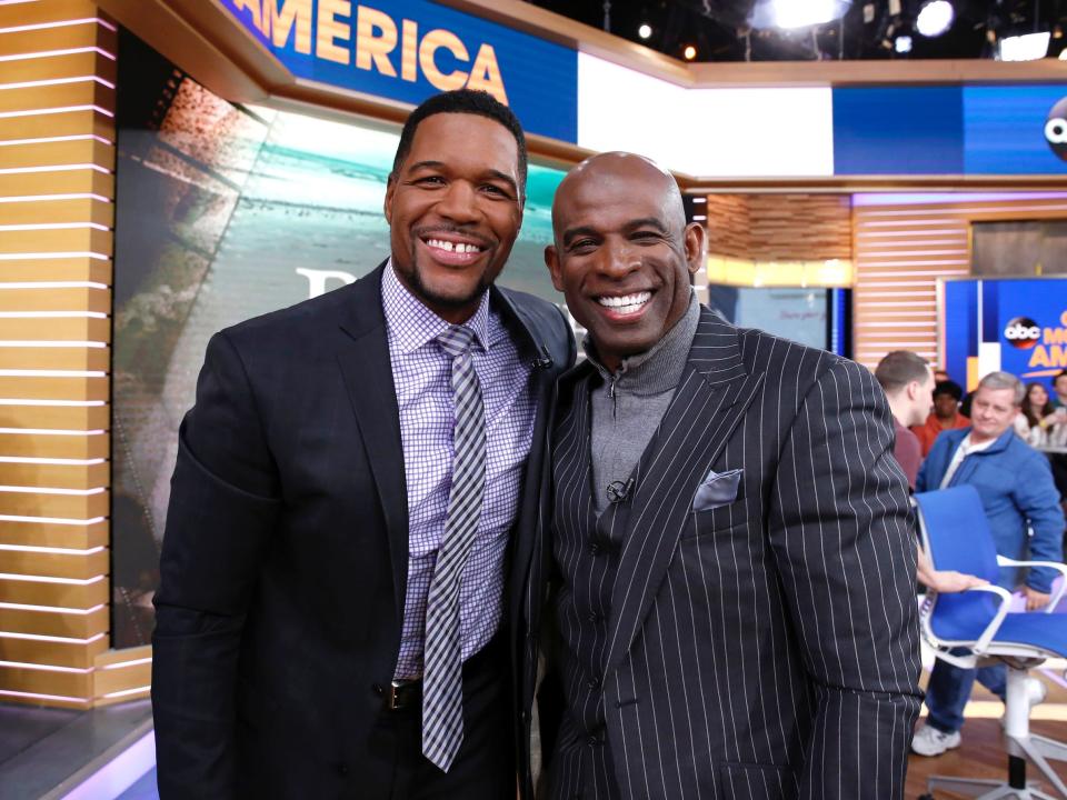 Michael Strahan (left) and Deion Sanders on the set of "Good Morning America."