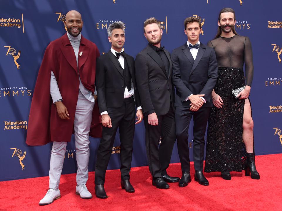 Kamaro Brown, left, Tan France, Bobby Berk, Antoni Porowski, and Jonathan Van Ness arrive at night two of the Creative Arts Emmy Awards at The Microsoft Theater on Sunday, Sept. 9, 2018, in Los Angeles. (Photo by Richard Shotwell/Invision/AP) ORG XMIT: CAJR109