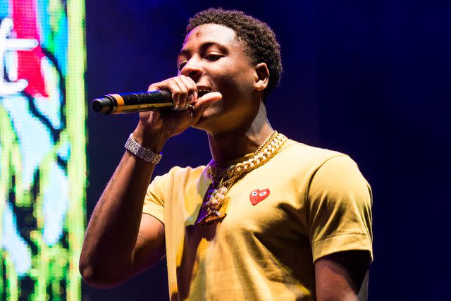 <p>Erika Goldring/Getty</p> YoungBoy Never Broke Again performs during Lil Weezyana at Champions Square on August 25, 2017 in New Orleans, Louisiana.