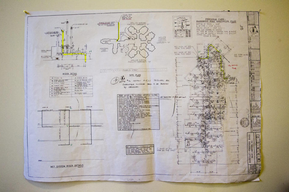 <span class="icon icon--xs icon__camera">  </span> <span class="credit font--s-m upper black"> <b>Handout</b> </span> <div class="caption space-half--right font--s-m gray--med db"> A blueprint for the Barclay Friends sprinkler system </div>