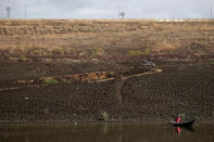 <p>A man sits in a boat in the Coremas reservoir in Coremas, Paraiba state, Brazil, Feb. 12, 2017. (Photo: Ueslei Marcelino/Reuters) </p>