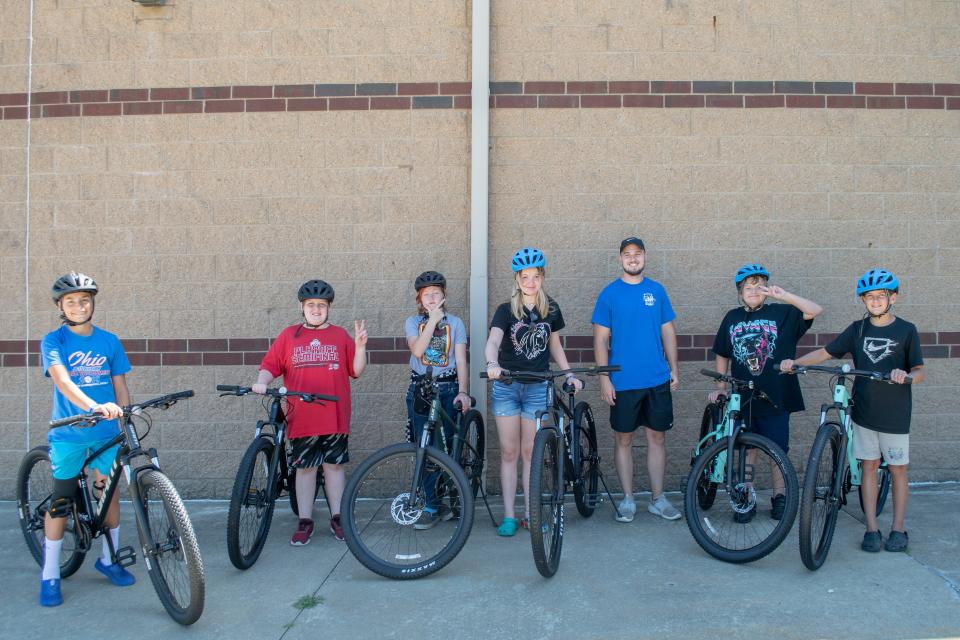 Students at the Cambridge Middle School CATS Camp participate in the bike club. The district used grant money to purchase the six new bikes, giving some riders their first chance to learn how to ride a bicycle. The group is still working on club name.