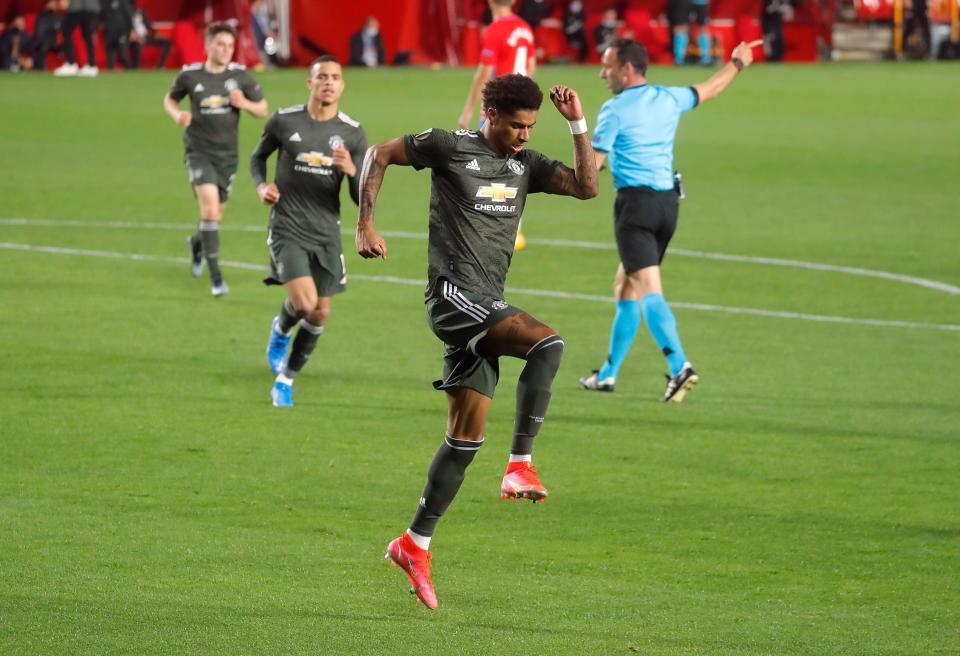 Marcus Rashford celebrates scoring United’s opener (Reuters)