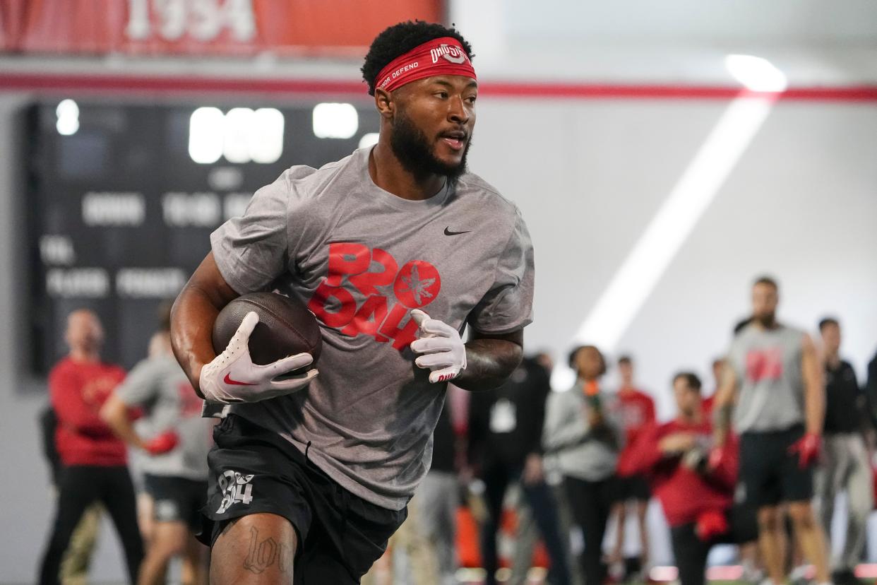 Mar 20, 2024; Columbus, Ohio, USA; Ohio State Buckeyes wide receiver Xavier Johnson catches a pass during Pro Day at the Woody Hayes Athletic Center.