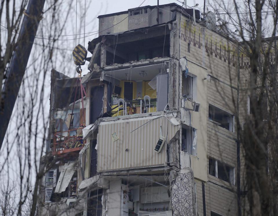 A photograph shows a residential building destroyed after a Russian missile strike, in Dnipro on January 16, 2023 (AFP via Getty Images)