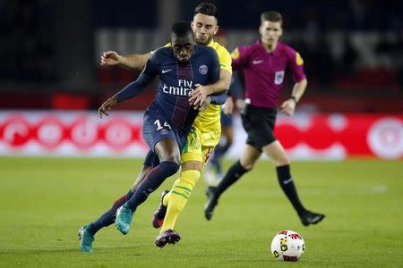 Football Soccer - Paris St Germain v Nantes French Ligue 1 - Parc des Princes, Paris, France - 19/11/16. Paris St Germain's Blaise Matuidi (L) challenges Nantes' Adrien Thomasson. REUTERS/Gonzalo Fuentes