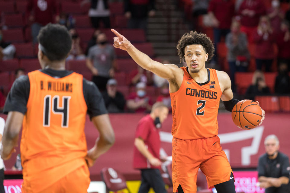 Oklahoma State Cowboys guard Cade Cunningham (2) calls a play during overtime against the Oklahoma Sooners on February 27th, 2021 at Lloyd Noble Center in Norman Oklahoma. (Photo by William Purnell/Icon Sportswire via Getty Images)