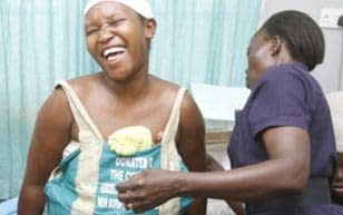 A Ugandan mother doing Kangaroo care with her child